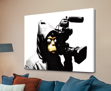 Banksy stencilled ape wearing a sandwich board, monochrome street-art graffiti canvas print