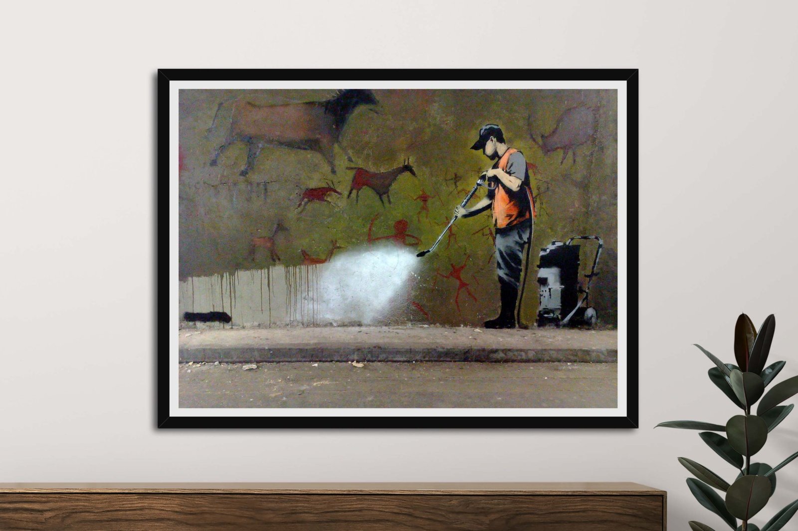 Banksy's Getting it Off the Wall as a framed print, an irreverent stencilled street-art statement in monochrome