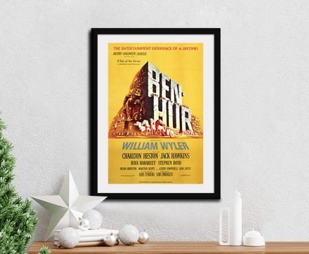 Framed 1959 Ben-Hur movie poster with bold yellow background and Charlton Heston credit
