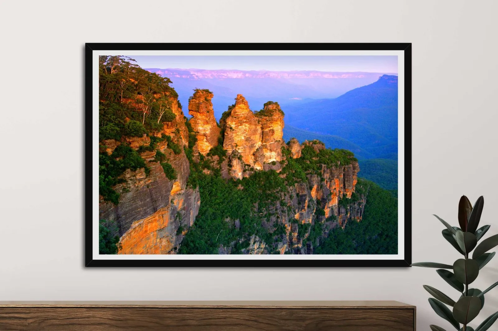 Hazy blue ridges of the Blue Mountains fading into the distance beneath a soft sky