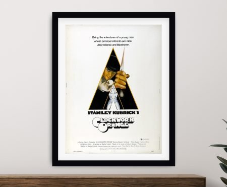 A Clockwork Orange framed film poster, Stanley Kubrick's 1971 dystopian classic with the bowler hat motif