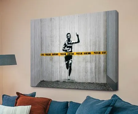 Banksy Don't Cross the Line stencil in stark graphic contrast