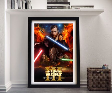 Revenge of the Sith star wars framed print under a shelf of design books beside a wicker basket