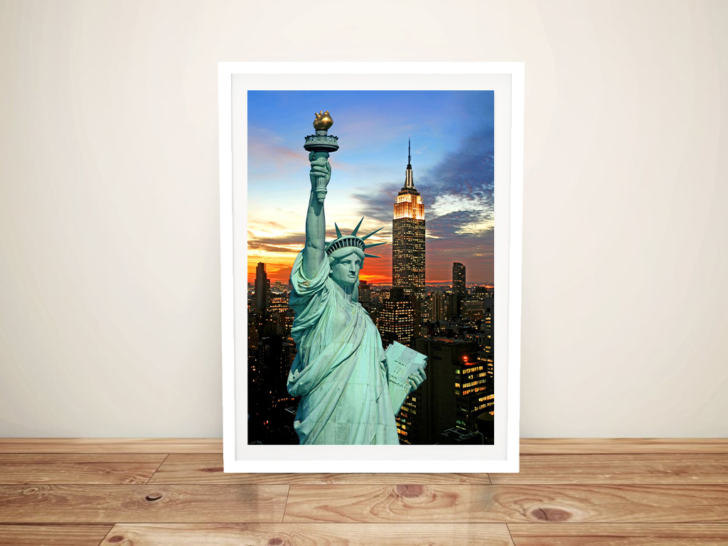 Framed print of the Statue of Liberty, cool tones against an open sky