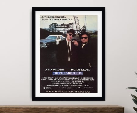 The Blues Brothers poster detail of the duo in black suits and dark glasses