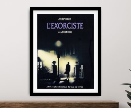 The Exorcist French movie poster with a figure beneath a fog-lit streetlamp