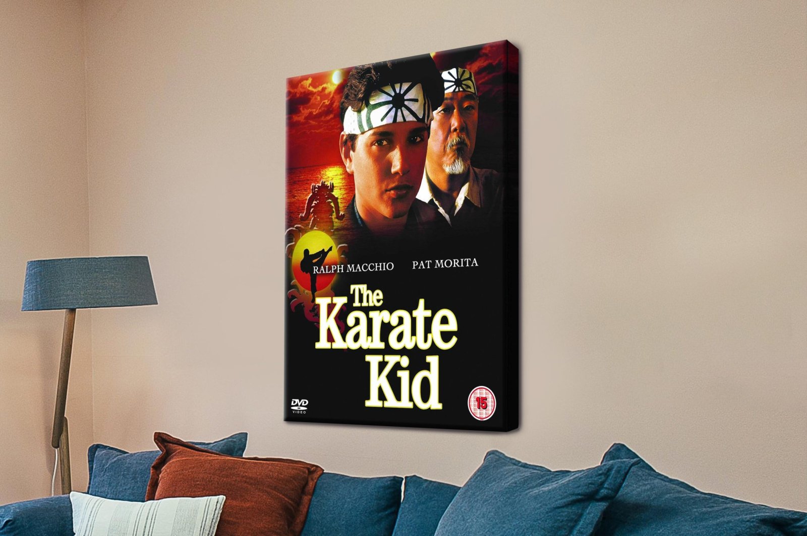 The Karate Kid canvas print featuring Ralph Macchio and Pat Morita above a blue sofa with rust cushions