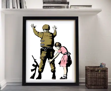 Pat Down by Banksy framed print, stencilled figures in a tense street confrontation