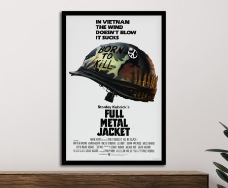 Framed Full Metal Jacket movie poster with camouflage helmet and Born to Kill slogan displayed on white wall