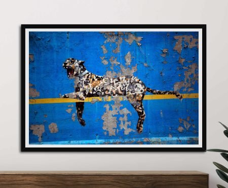 Banksy Bronx Zoo Cheetah canvas print - spotted cheetah escaping cage bars in urban setting graffiti street art