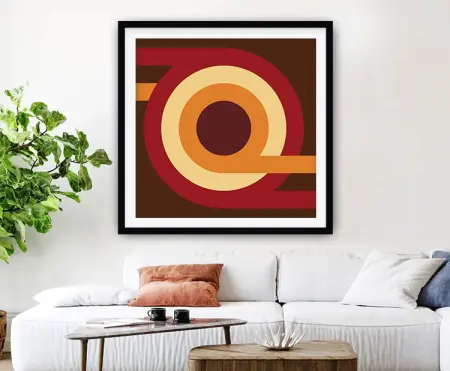 Framed print of a 70s geometric design built from mustard and brown squares
