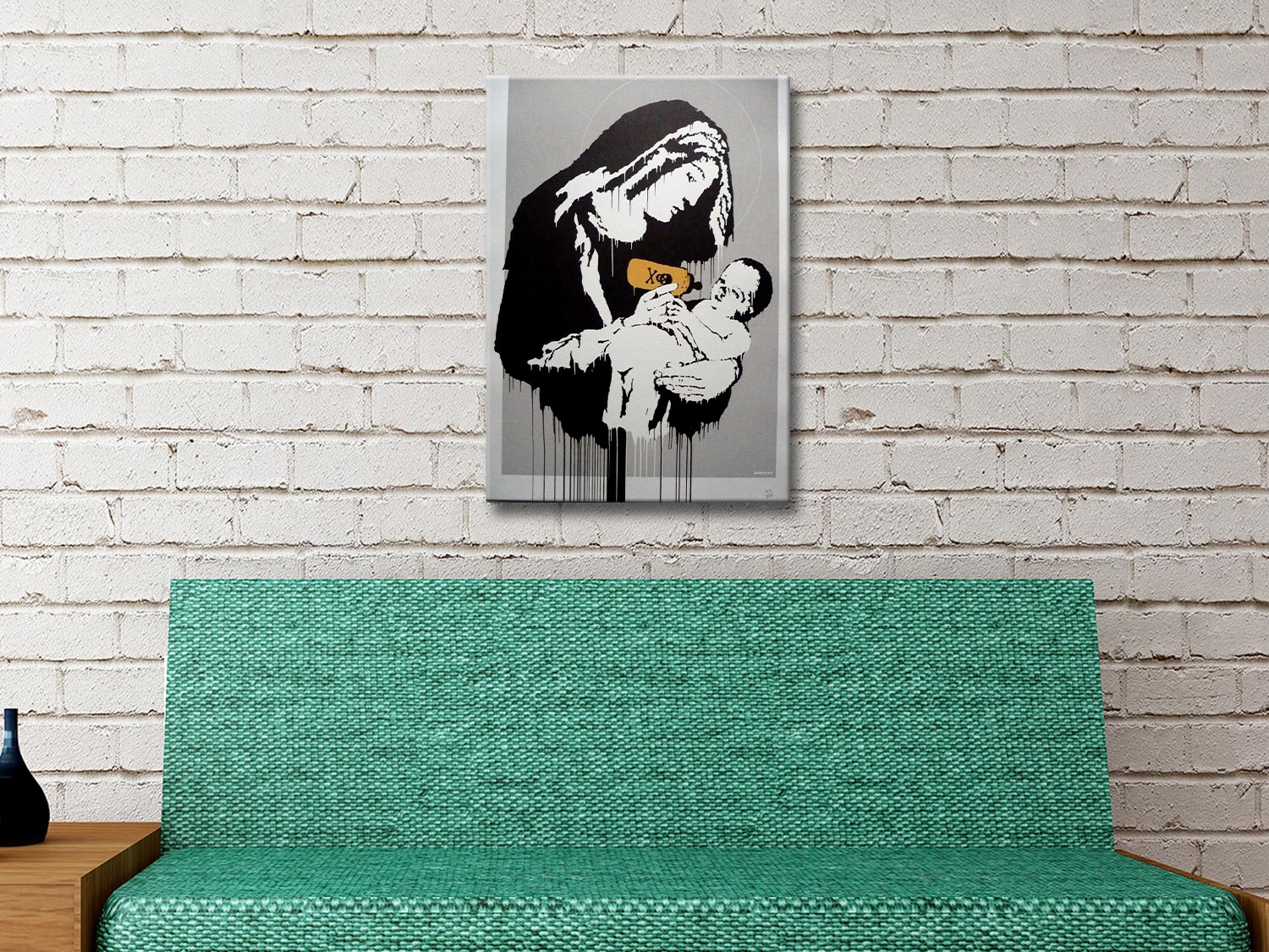 Toxic Mary by Banksy, subversive stencil of Madonna and child in stark tones