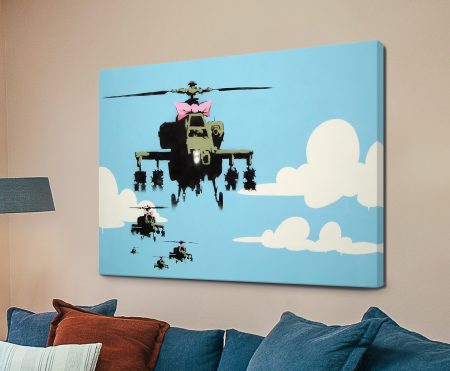 Happy Choppers by Banksy, military helicopter crowned with a pink bow in stark stencil style
