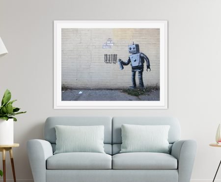 Banksy stencil of a robot spray-painting a barcode