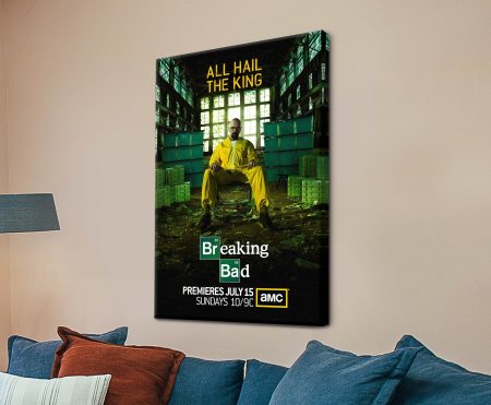 Breaking Bad canvas poster showing Walter White in yellow hazmat suit displayed above a blue sofa in living room