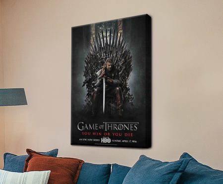 Game of Thrones canvas print featuring Ned Stark on the Iron Throne above a blue sofa in a beige lounge