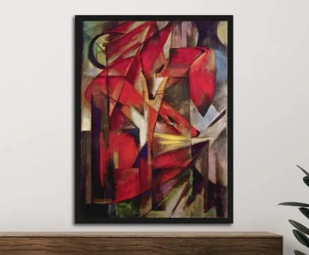 Franz Marc Foxes cubist painting in black frame above timber sideboard, deep red and earthy tones on white wall