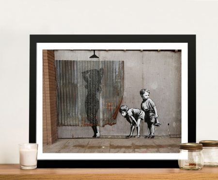 Banksy Peeking Kids framed canvas, stencilled children peering through a gap