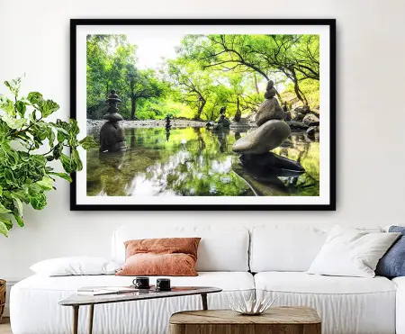 Peaceful Japanese garden with a pond, stone lantern and maple foliage