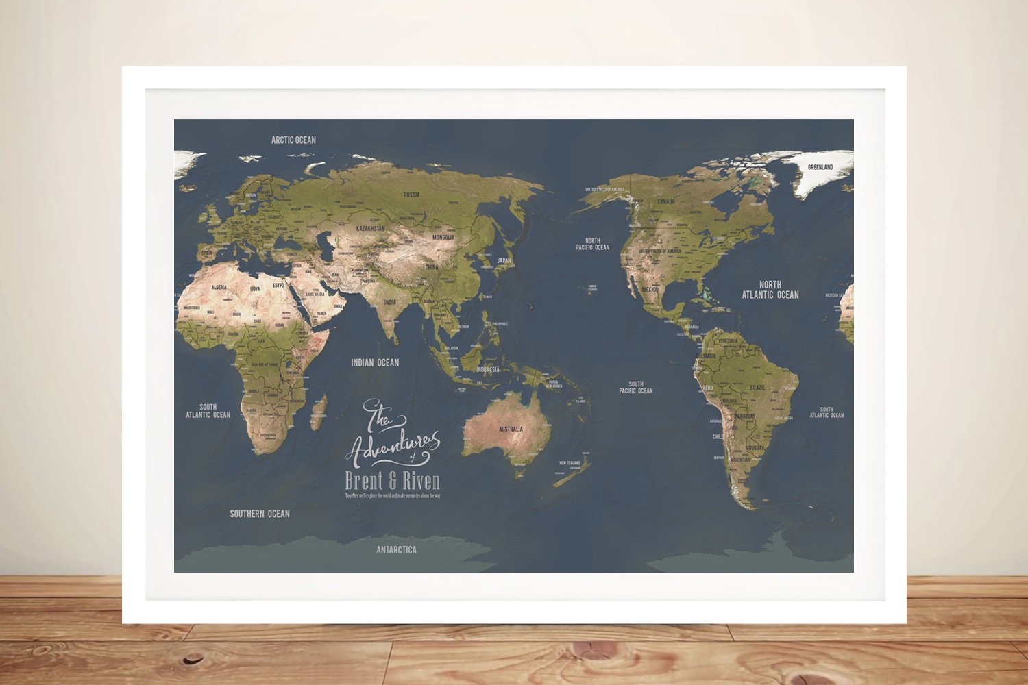 Framed charcoal Pacific-centred push pin map, moody grey travel-map tones for a study