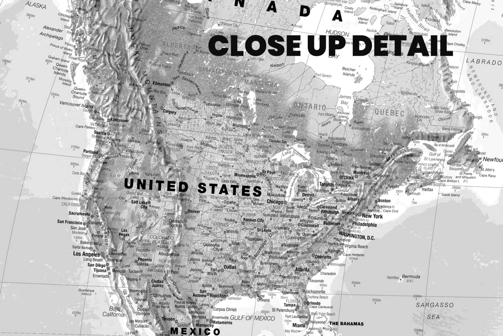 Atlantas push pin map close-up, crisp black-and-white coastlines on a fine detailed surface