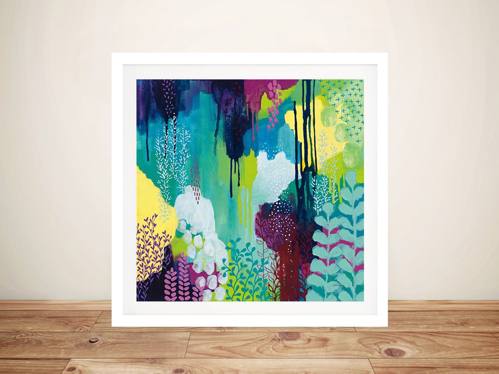 Kathy Ferguson Jewel Forest I framed print with vibrant teal, purple and lime abstract botanical artwork against neutral wall