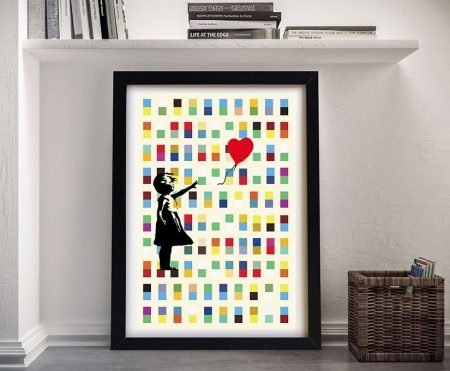Girl with Balloon by Banksy in a black frame