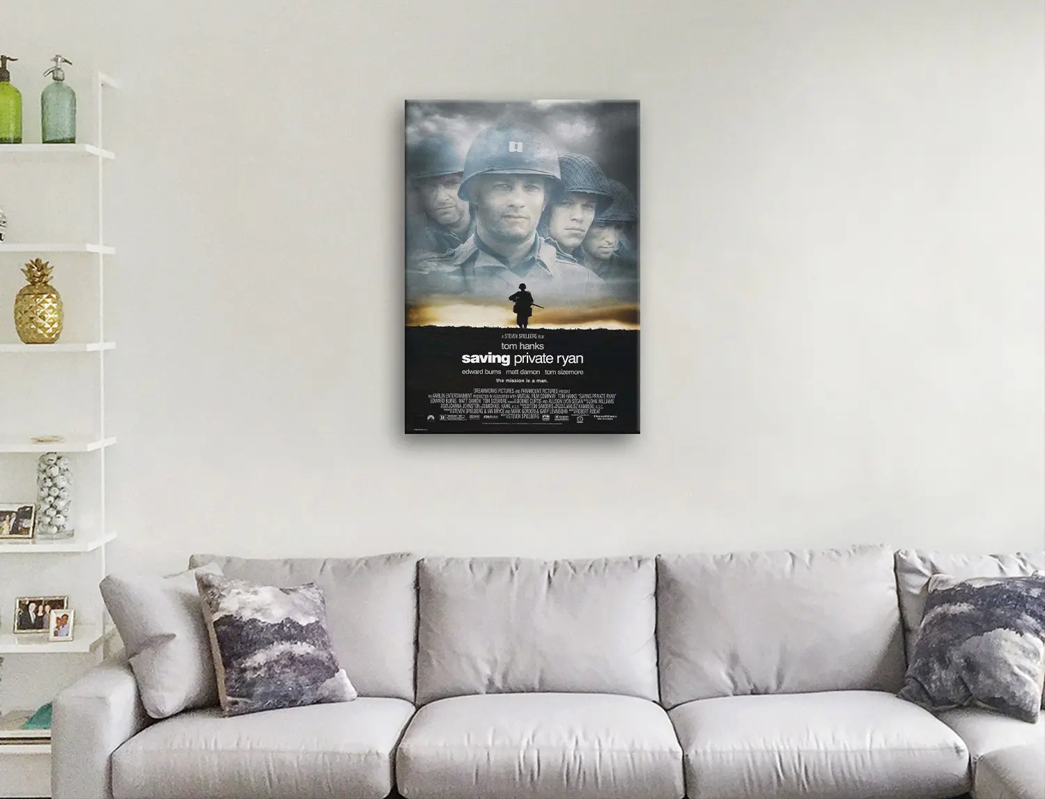 Saving Private Ryan canvas print featuring Tom Hanks above a grey sofa in a bright neutral living room