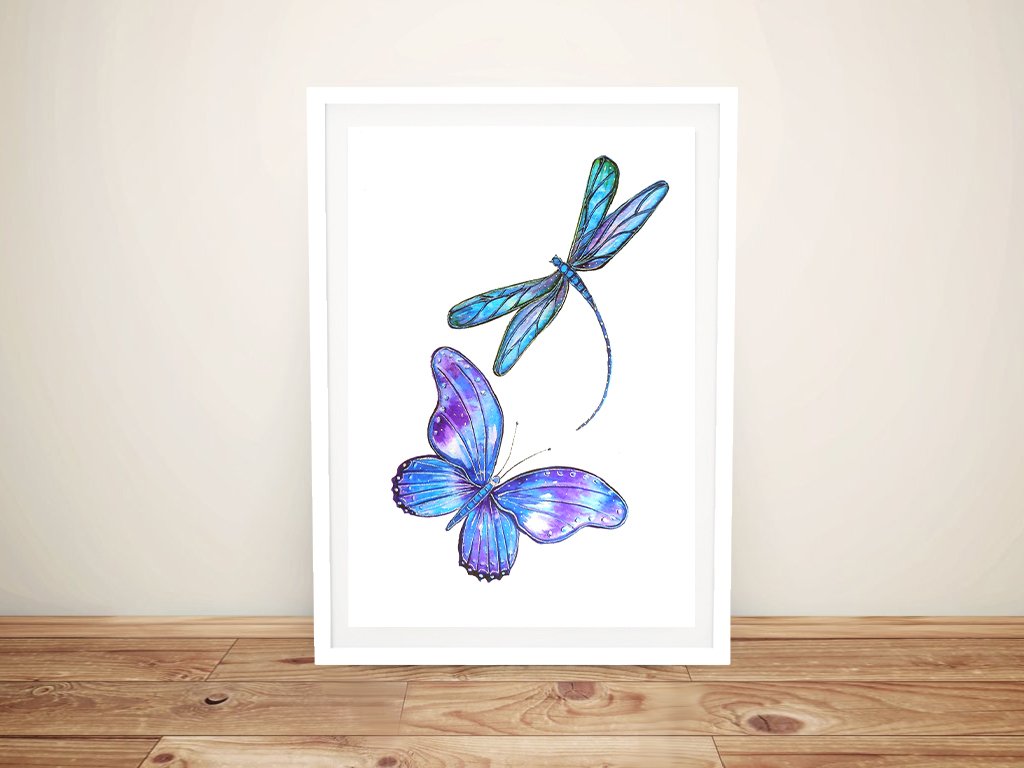 Watercolour butterfly and dragonfly print by Linda Callaghan in vivid blue and purple tones, white framed on timber floor