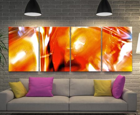 Struggle for Peace four-panel abstract canvas in fiery orange, red and yellow tones above a grey sofa with pink and yellow cushions