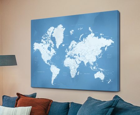 Canvas print of a powder blue world map, calm soft mood for a Perth office