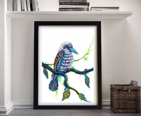 Kookaburra animal art print framed in black under a styled bookshelf
