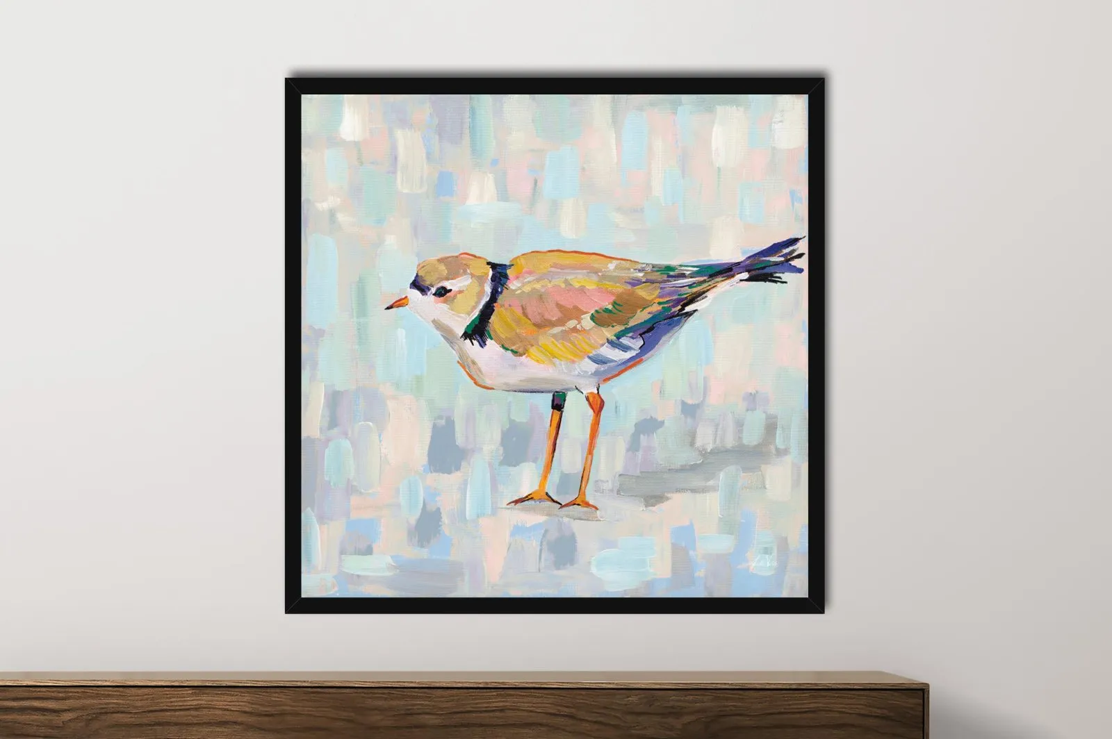 Coastal Plover Neutral IV Jeanette Vertentes animal art print framed black above timber sideboard