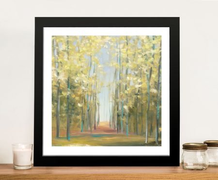 Framed aspen grove with pale slender trees and golden autumn foliage