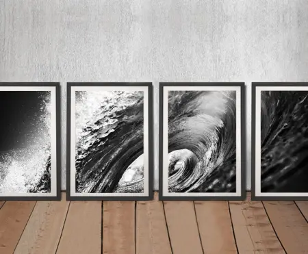 Framed four piece black and white surf wave canvas