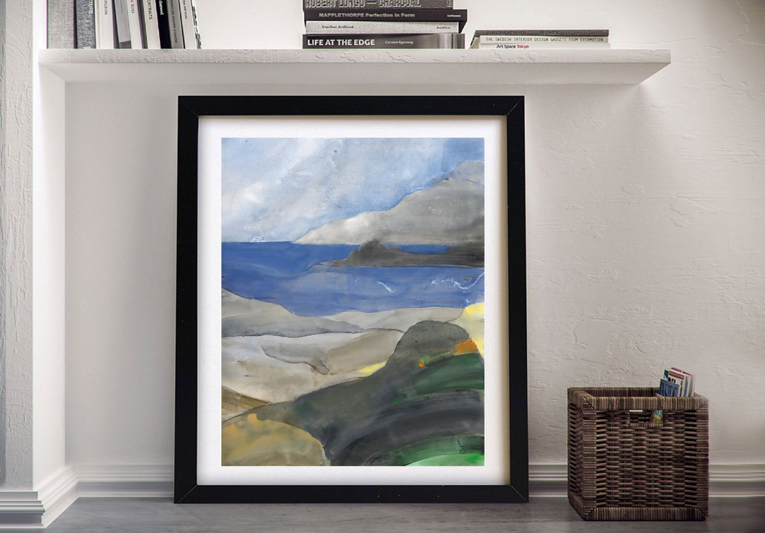 Above the Bay II framed print with blue sea, grey clouds and green coastal hills