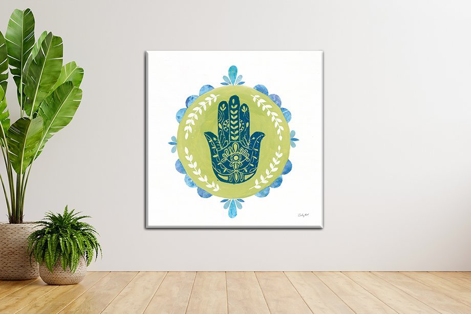 Navy Hamsa hand on a green circular mandala by Courtney Prahl
