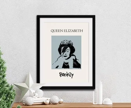 Framed Banksy portrait of the Queen with a lightning-bolt face