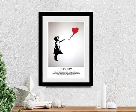 Framed Banksy Girl with a Balloon canvas, child reaching for a red heart balloon