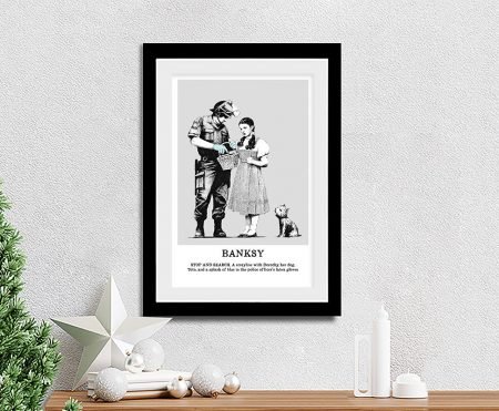 Framed Banksy Stop and Search canvas, Dorothy searched by a soldier in bold stencil