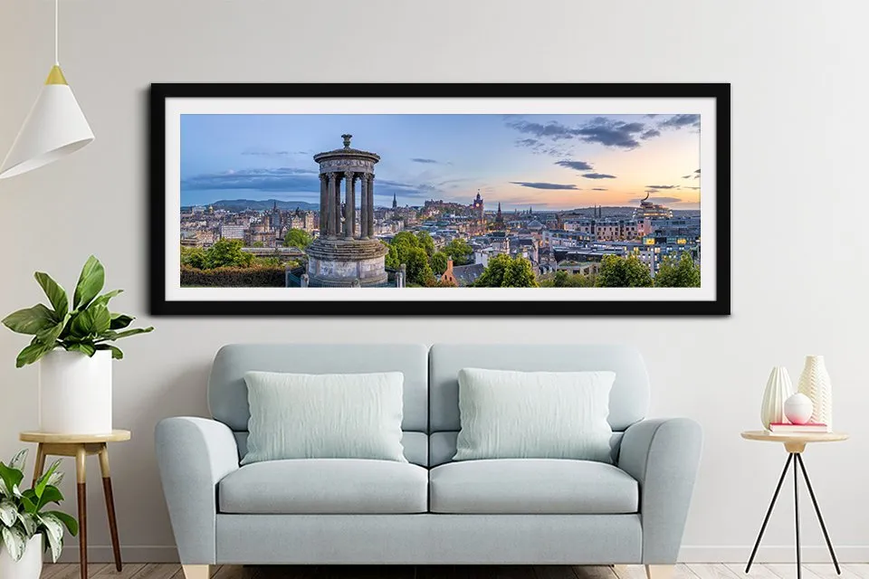 Framed print of an Edinburgh street at dusk with lamplit historic facades