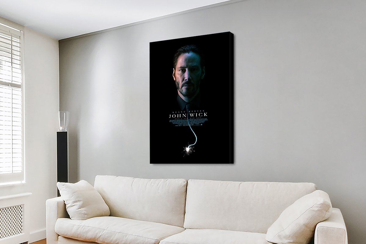 John Wick Chapter 2 canvas print of Keanu Reeves against a black background with a lit fuse glow