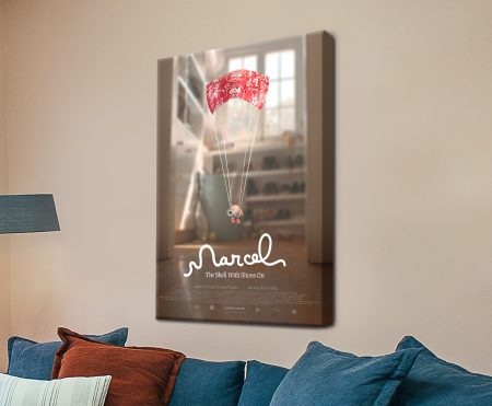 Marcel the Shell poster of the tiny shell parachuting on a red wrapper in warm beige