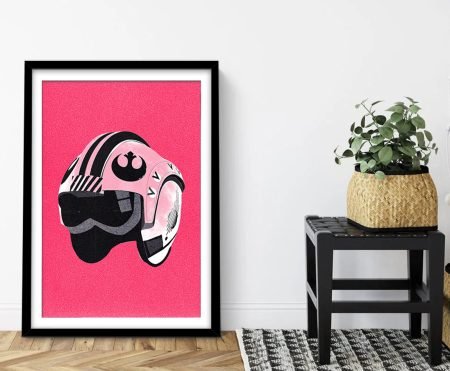 Framed pop-art print of Luke Skywalker's Red 5 X-wing pilot helmet in pink and black