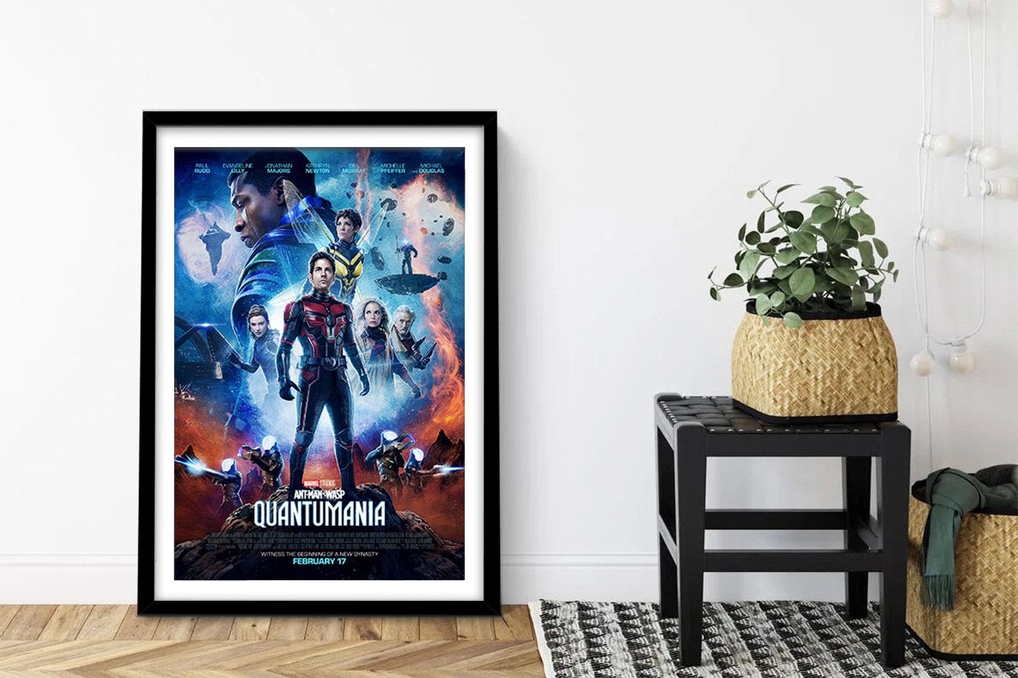 Ant-Man and the Wasp: Quantumania poster with the heroes set against the Quantum Realm