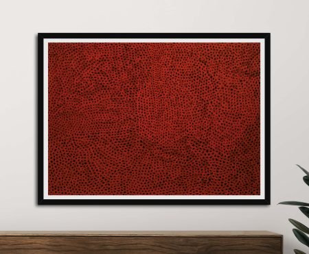 Framed Yayoi Kusama Untitled circa 1960 print with deep red infinity net pattern and black dots above timber sideboard