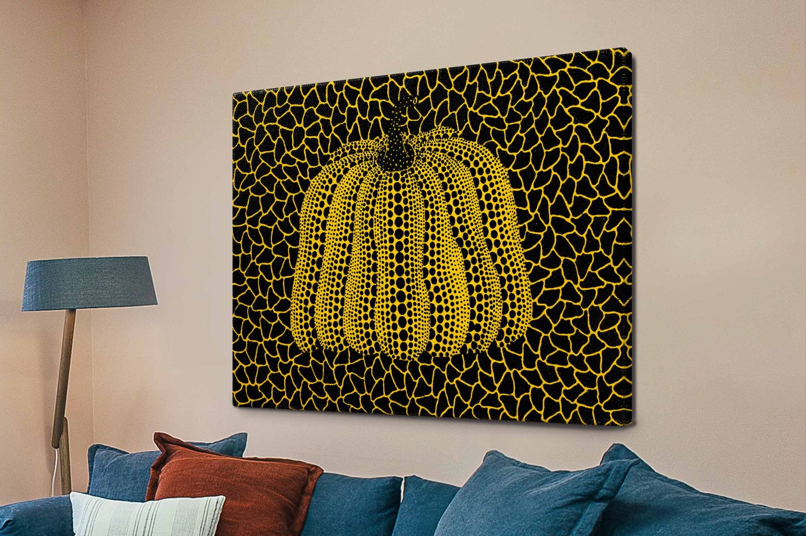 Yayoi Kusama Yellow Pumpkin, a vivid yellow gourd patterned with black polka dots