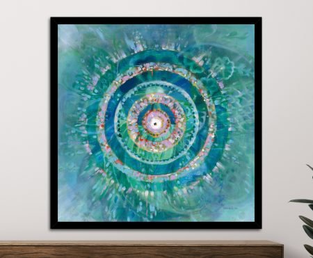 Danhui Nai Ocean Mandala framed print in black frame on neutral wall above timber console with green plant