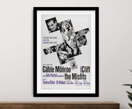 The Misfits vintage film poster in atmospheric grey tones