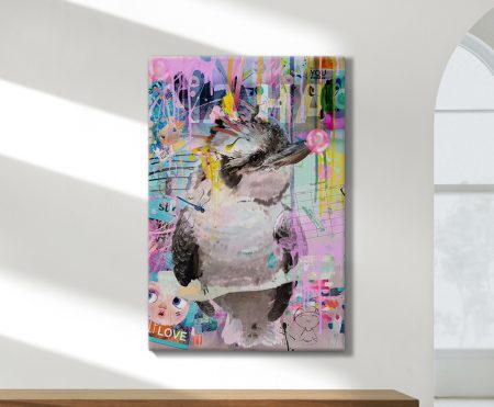 Quirky kookaburra pop art canvas by Karin Roberts with pink graffiti splashes hung above timber sideboard in sunlit room